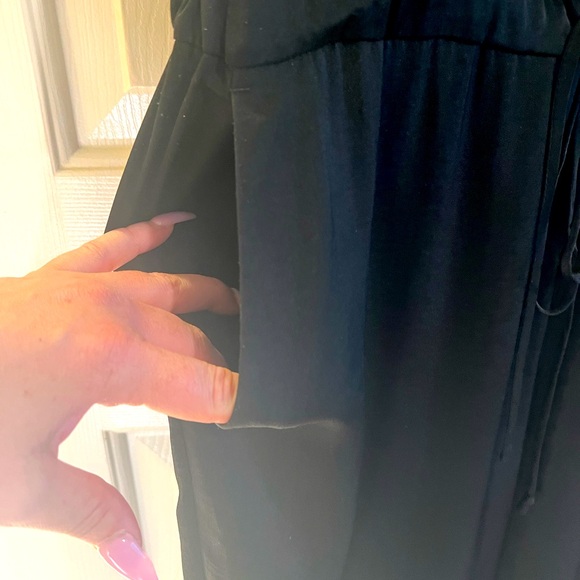 Sexy & Sophisticated BCBGMaxAzria Black Lace Detail Jumpsuit with Pockets - Picture 7 of 10